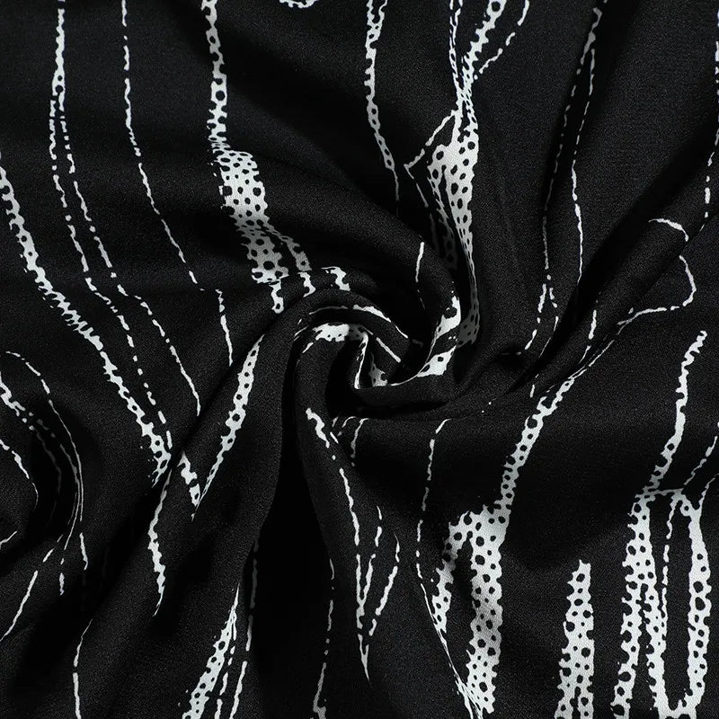 Beat The Heat in Fashion with Our Black Patterned Short Sleeve Shirt for Men