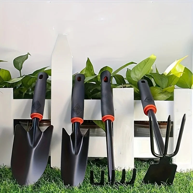 Gardening Tools Including a Small Shovel for Planting Flowers, a Five-Pronged Rake, a Double-Headed Rake