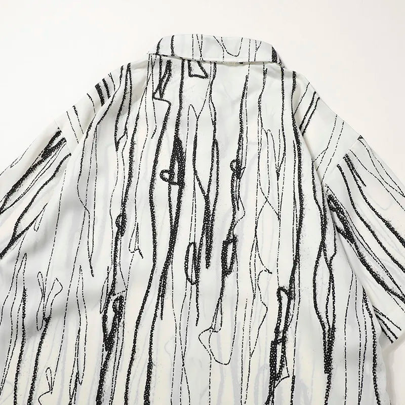 Beat The Heat in Fashion with Our Black Patterned Short Sleeve Shirt for Men