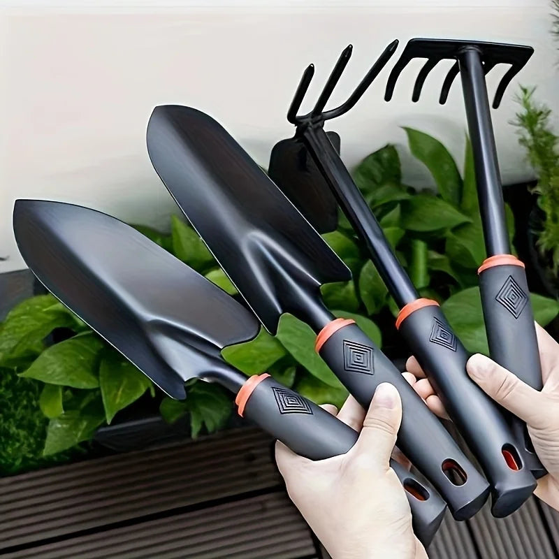 Gardening Tools Including a Small Shovel for Planting Flowers, a Five-Pronged Rake, a Double-Headed Rake